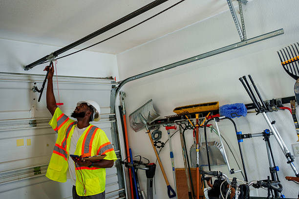 Professional Garage Door Panel Replacement technician working in East Wenatchee, WA